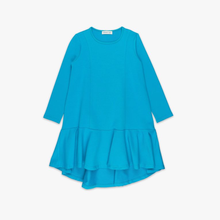 Loose dress is a loose fit dress, that goes wider to the bottom. It is longer on the back with a wide frilled trim at the bottom. Dress is in blue colour. Children, 3 -10 yrs. BonnyJoy - in front