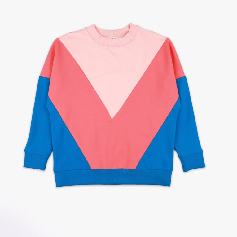 Batwing sweatshirt is a loose fit top with triangular form color blocks. It comes in a combo of three colours - powder, salmon and deep blue. Front view, the sweatshirt itself. Children, 3 -10 yrs. BonnyJoy