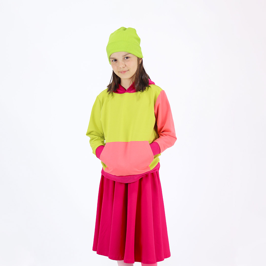 Colour Block Sweatshirt is a regular fit hooded sweatshirt with a kangaroo pocket in front. Front and back and right sleeve in bright lime colour. The hood and the hand cuffs - raspberry. The pocket and the left sleeve - salmon. Front view. Children, 3 -10 yrs. BonnyJoy