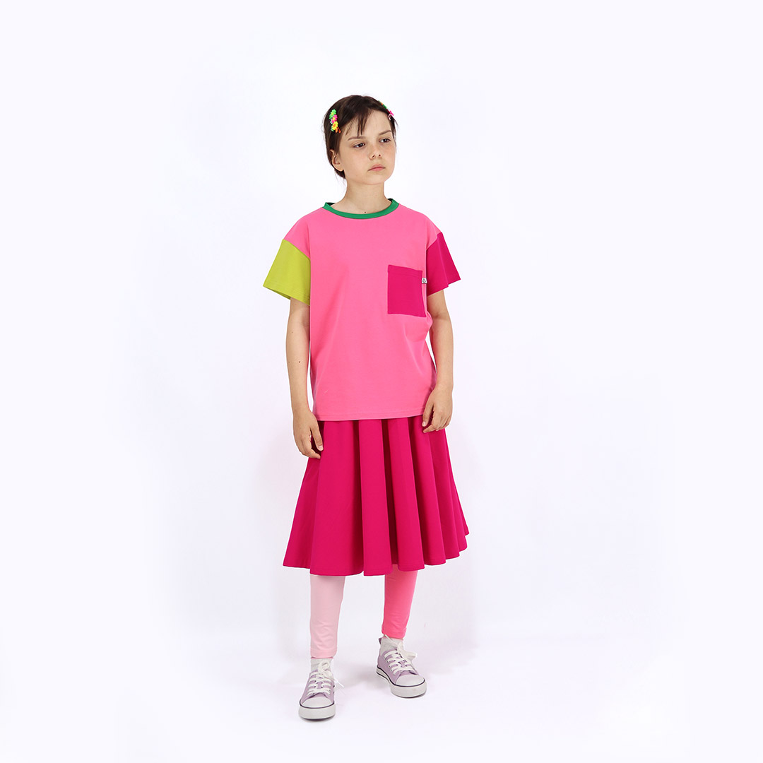 Our joyful skirt is a loose midi skirt in raspberry colour. Front view. Children, 3 -10 yrs. BonnyJoy