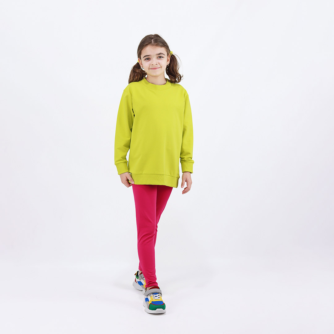 Joyful Sweatshirt is a loose fit top with minimalist design in bright lime colour that features a ribbed neck, sleeve ends and bottom hem. Another front view. Children, 3 -10 yrs. BonnyJoy