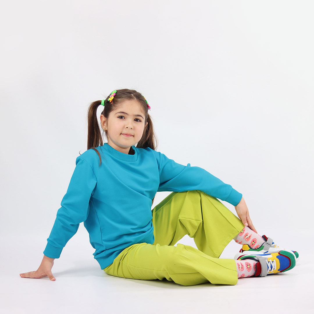 Joyful Sweatshirt is a loose fit top with minimalist design in electric blue colour that features a ribbed neck, sleeve ends and bottom hem. Another front view. Children, 3 -10 yrs. BonnyJoy