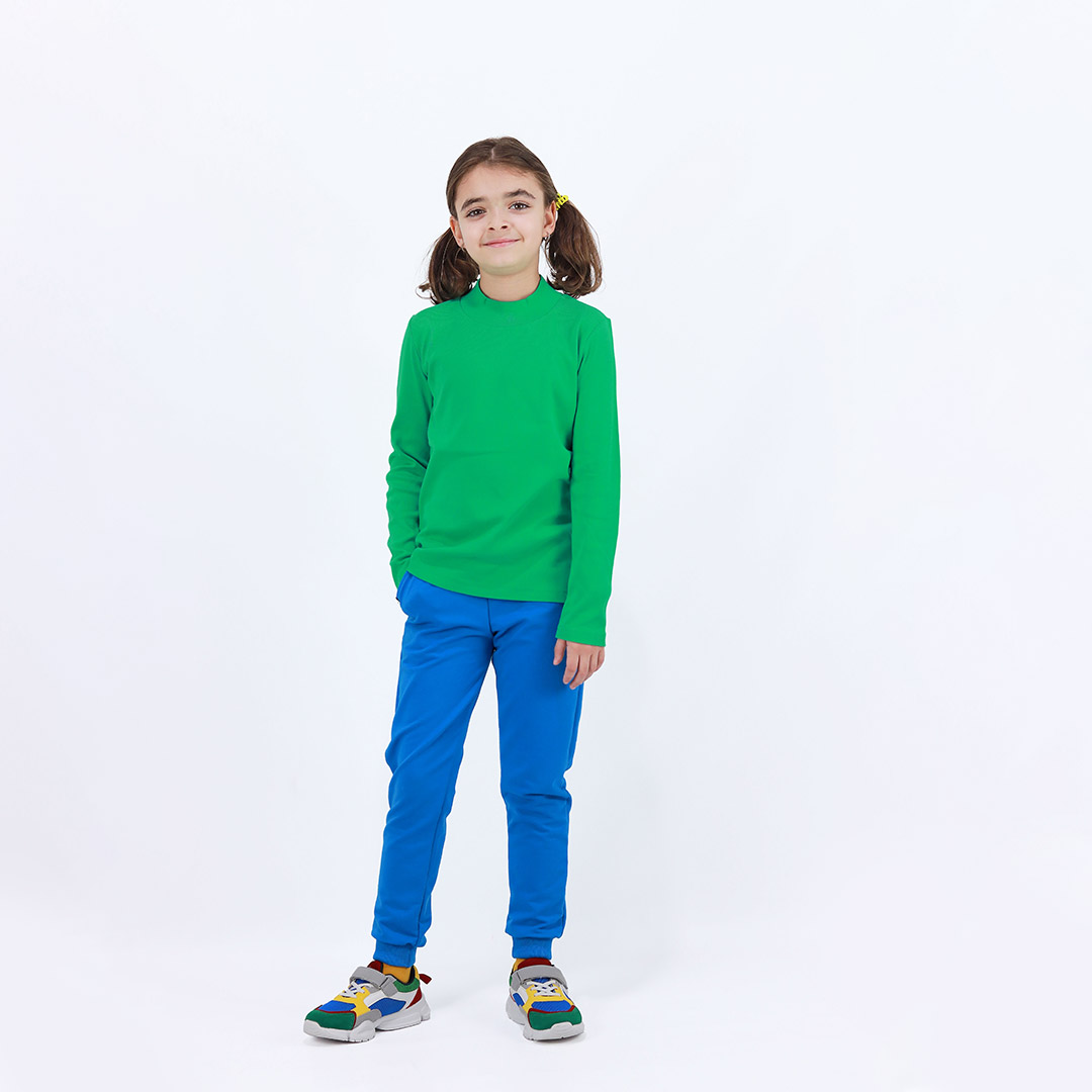 Turtleneck loose top is a classic top in green colour. Front view. Children, 3 -10 yrs. BonnyJoy