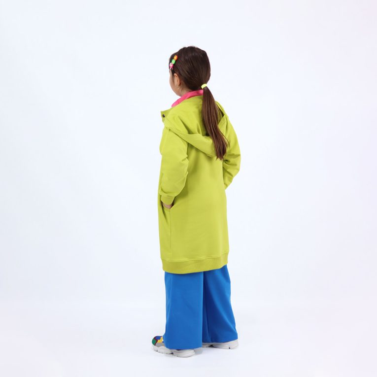 Long buttoned hoodie has a straight loose fit and minimalist design in bright lime colour. It closes up with snap buttons and features hign ribbed neck and ribbed hand cuffs and bottom hem. Back view. Children, 3 -10 yrs. BonnyJoy