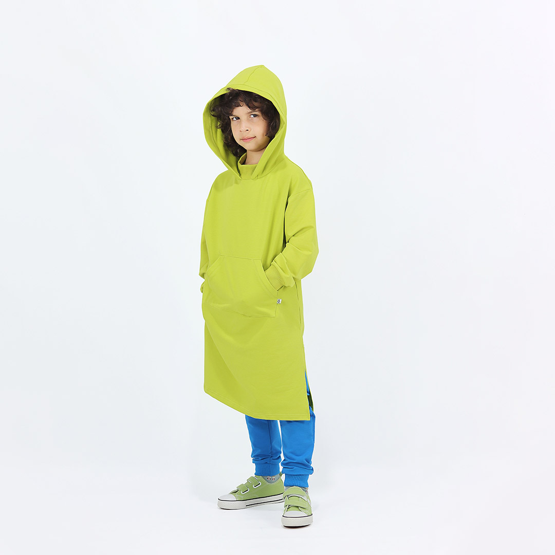Long hoodie with high ribbed neck in bright lime colour. It features ribbed hand cuffs and a kangaroo pocket. The hoodie is a little longer on the back. Another front view. Children, 3 -10 yrs. BonnyJoy