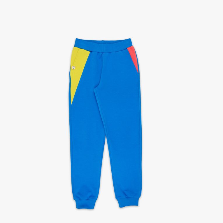 Slim Fit Colour Block Joggers are a pair of sweatpants in deep blue with two Italian type side pockets in different colours - bright lime and salmon. It features ribbed waist and cuffs. Front view, the joggers themselves. Children, 3 -10 yrs. BonnyJoy