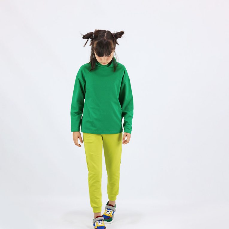 Slim fit joggers is a pair of sweatpants with two Italian type side pockets, ribbed waist and cuffs. The whole pair is in one distinctive colour - bright lime. Children, 3 -10 yrs. BonnyJoy