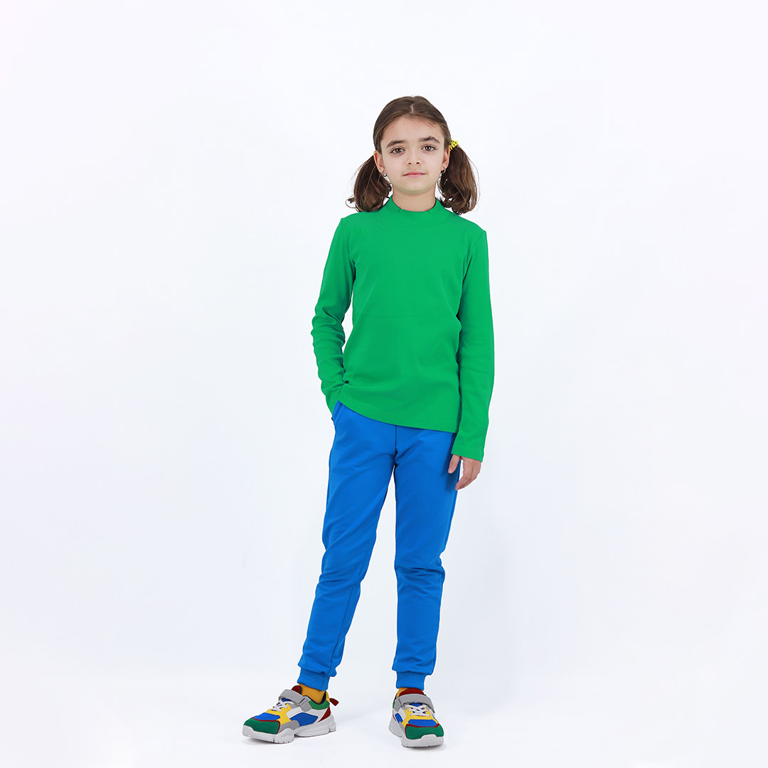 Slim fit joggers is a pair of sweatpants with two Italian type side pockets, ribbed waist and cuffs. The whole pair is in one distinctive colour - deep blue. Front view. Children, 3 -10 yrs. BonnyJoy