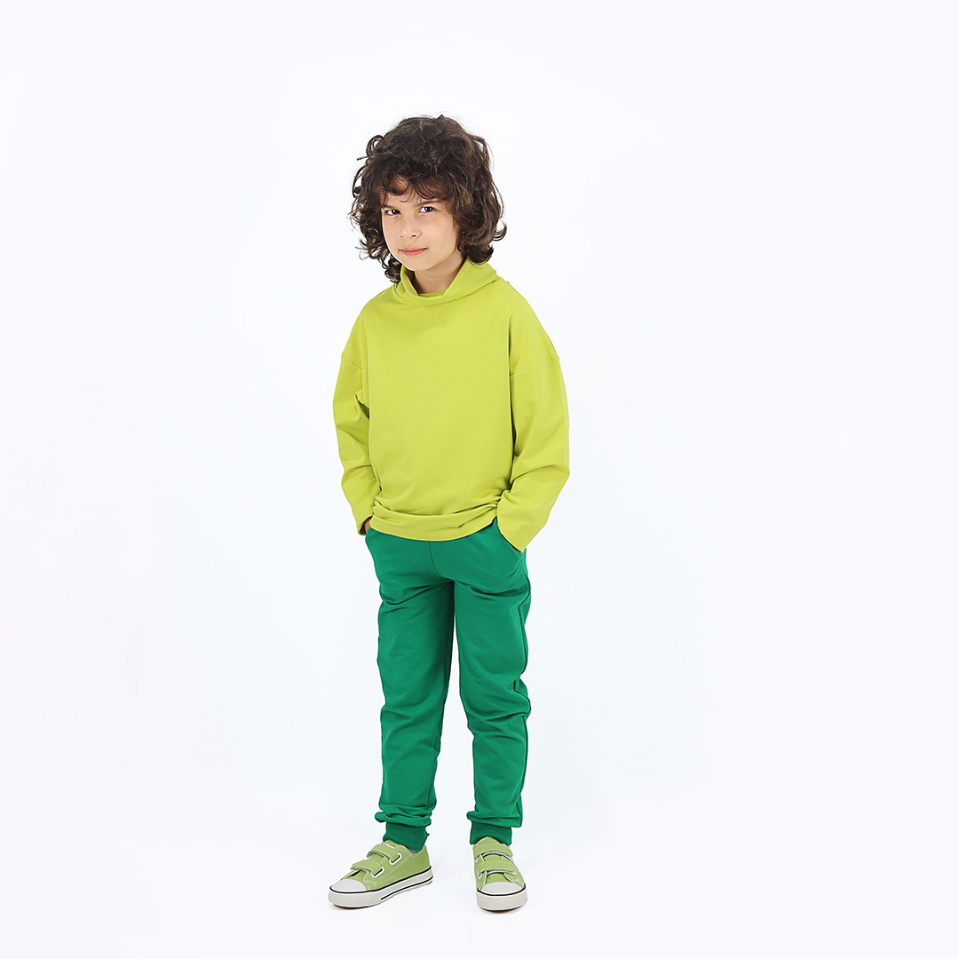 Turtleneck loose top is a classic top loose on the neck in bright lime colour. Another front view. Children, 3 -10 yrs. BonnyJoy