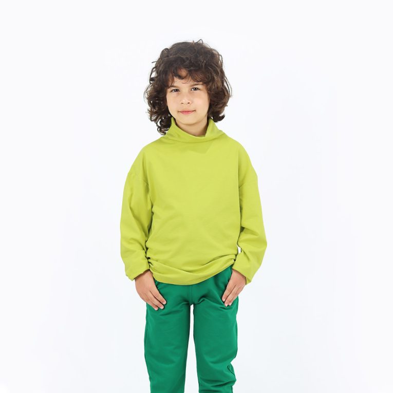 Turtleneck loose top is a classic top loose on the neck in bright lime colour. Children, 3 -10 yrs. BonnyJoy
