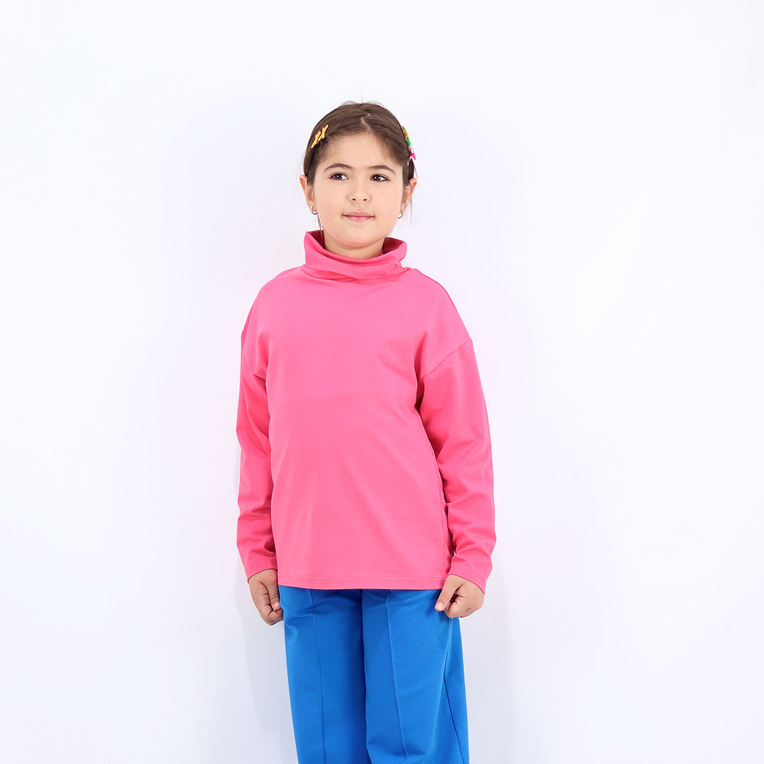 Turtleneck loose top is a classic top loose on the neck in pink colour. Children, 3 -10 yrs. BonnyJoy