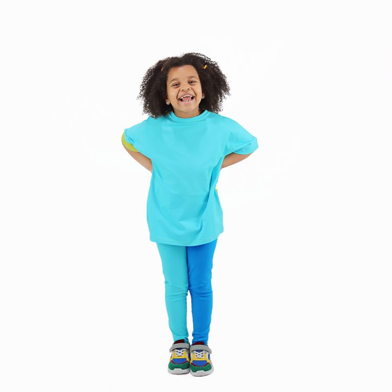 Two-colour leggings with two different colour legs. Left leg is blue, right leg is electric blue and electric blue weist. Children, 3 -10 yrs. BonnyJoy