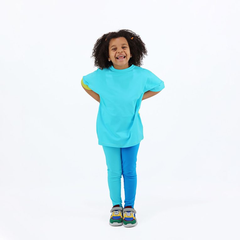 Our two-way top is a loose fit top with short sleeves in two colours. On one side is bright lime, on the other - blue colour. You could wear it front on the back and the other way round. Blue in front. Children, 3 -10 yrs. BonnyJoy