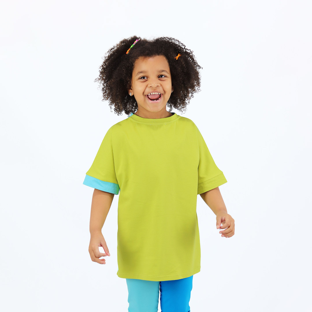 Our two-way top is a loose fit top with short sleeves in two colours. On one side is bright lime, on the other - blue colour. You could wear it front on the back and the other way round. Bright lime in front. Children, 3 -10 yrs. BonnyJoy
