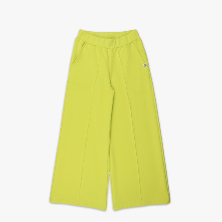 Wide leg pants with an edge hem in front and ribbed waist. Loose fit pants in bright lime colour. Front view, the pants themselves. Children, 3 -10 yrs. BonnyJoy