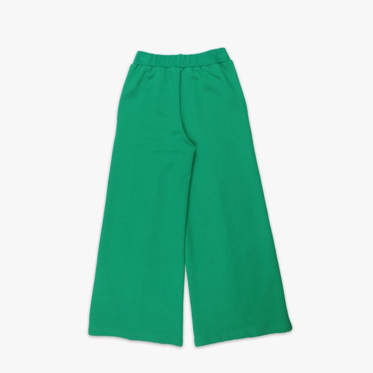 Wide leg pants with an edge hem in front and ribbed waist. Loose fit pants in green colour. Back view. Children, 3 -10 yrs. BonnyJoy